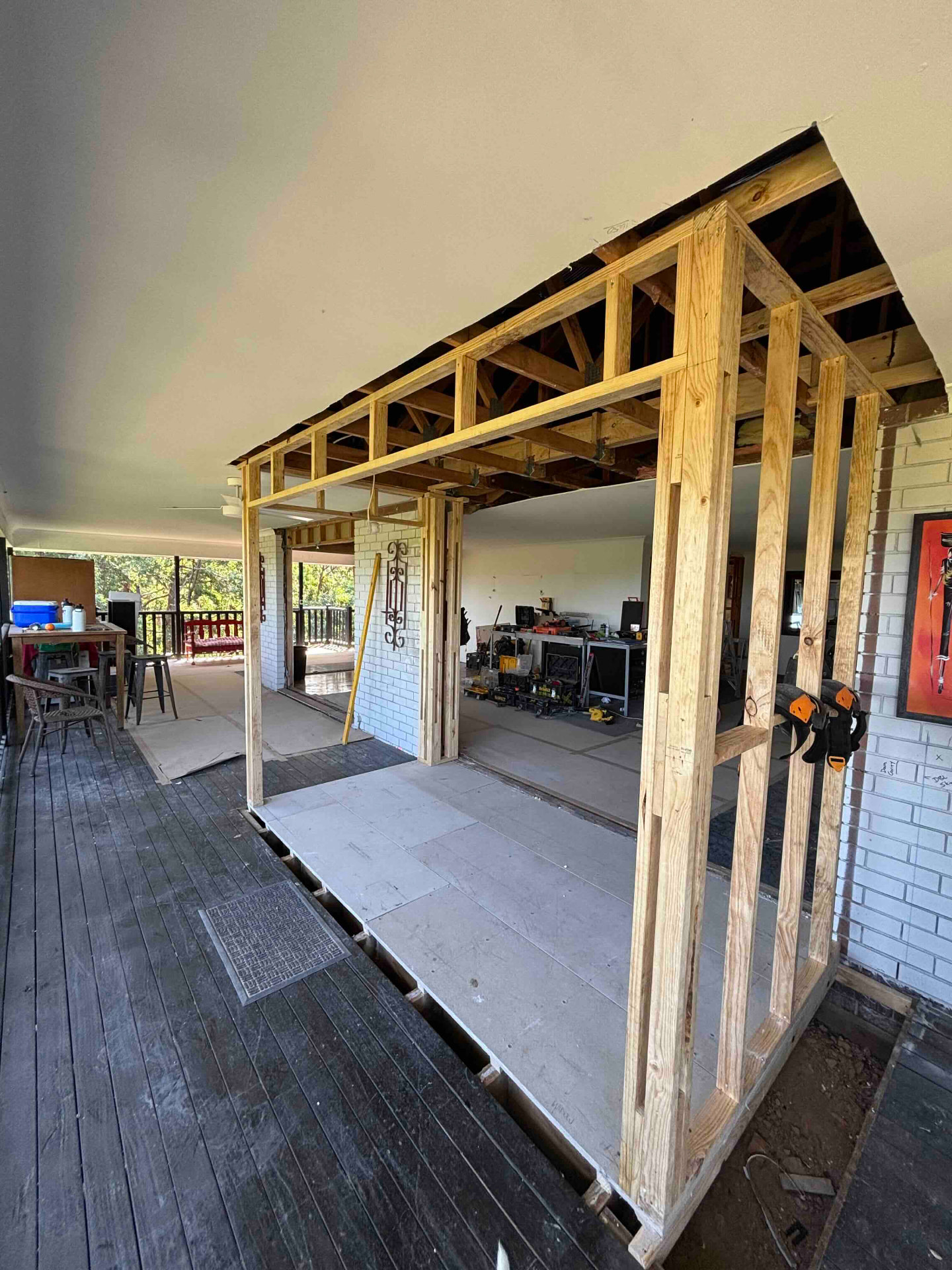 New timber framing carrying the roof where an internal wall was removed during a renovation